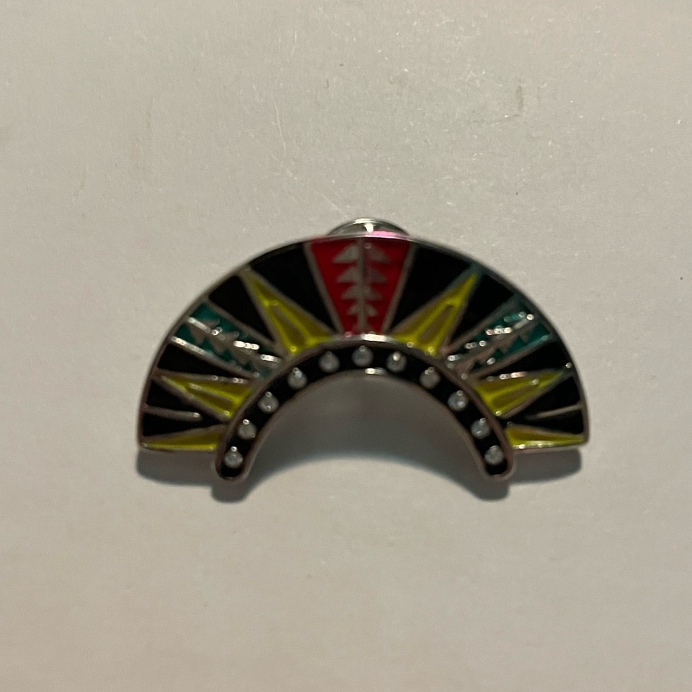 Half circle brooch. Red, yellow, teal and black with tiny QZ gems
